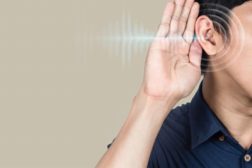Man experiencing hearing issues